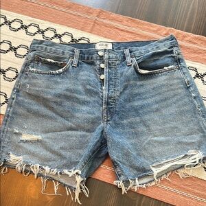 Agolde new never worn. Without tags.Distressed Denim Cut-Off Shorts with Raw Hem